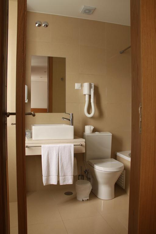 Hotel Zenite Ангра-ду-Ероїшму Номер фото
