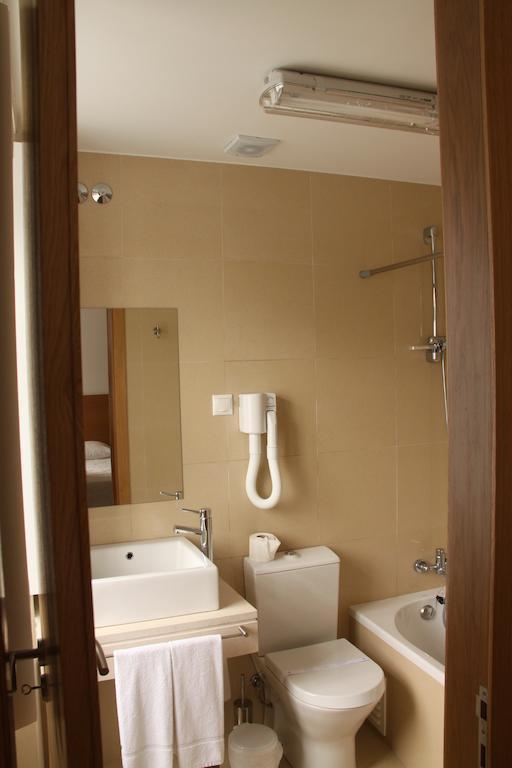 Hotel Zenite Ангра-ду-Ероїшму Номер фото